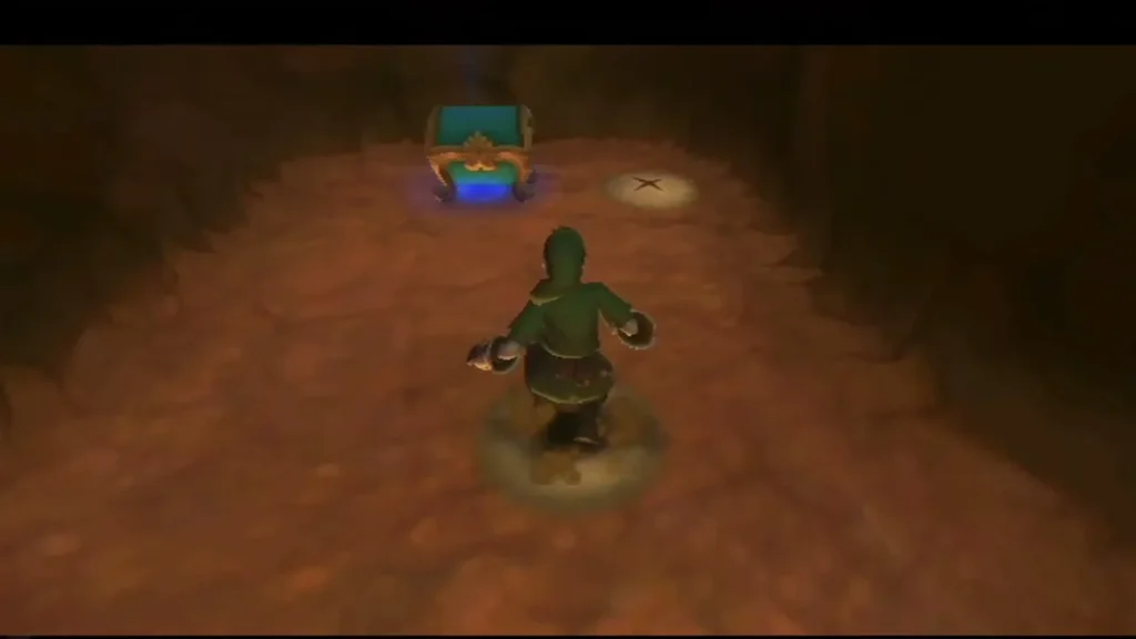 Link walks across a reddish cave floor toward a teal chest with blue light beneath it.