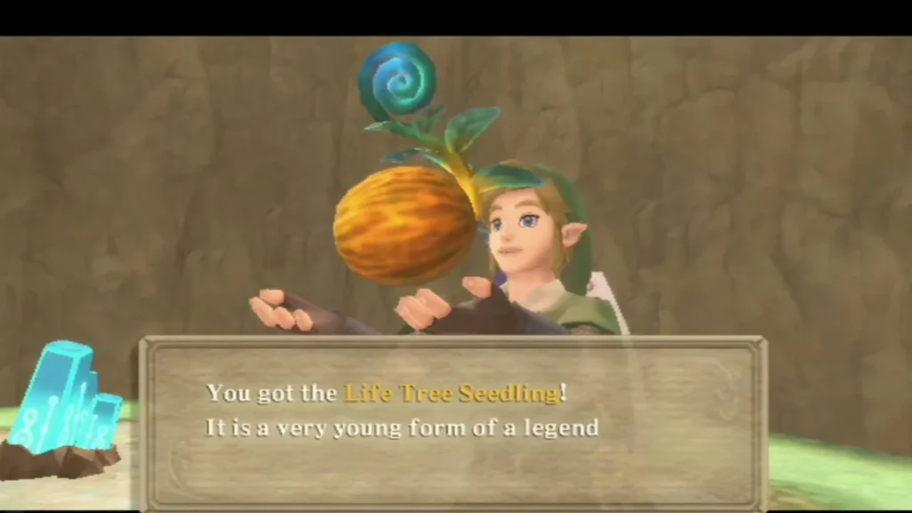 Link holds up the Life Tree Seedling, a sprout with a golden fruit, its message box fully typed.