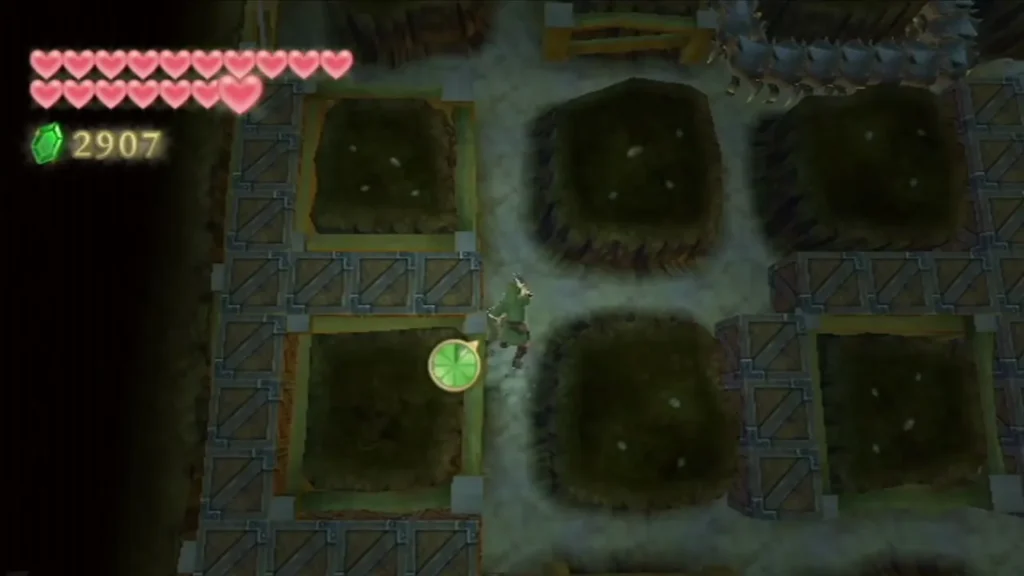 Link tunnels through the underground pit maze, with a Moldorm crawling along the path above him.