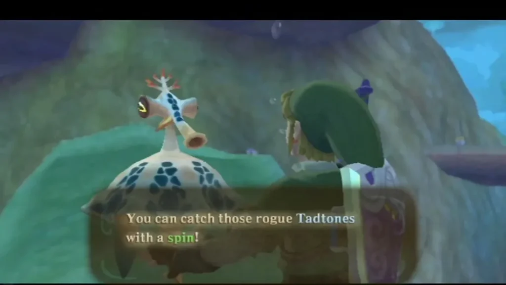 A bean-shaped guide explains that rogue Tadtones can be caught with a spin attack.