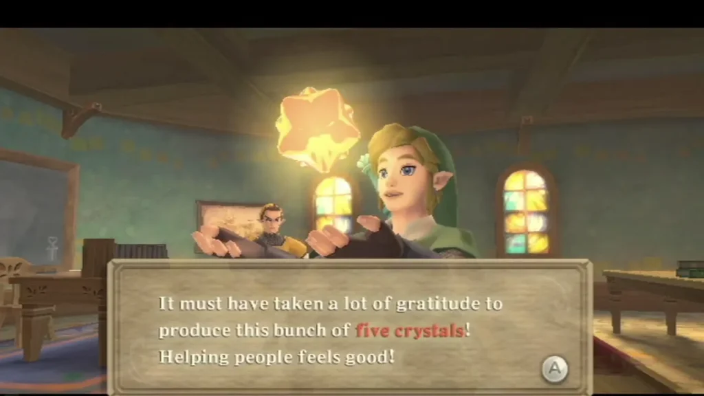 A bunch of five Gratitude Crystals glows above Link in a classroom, with the reward message fully written in the box. A bunch of five Gratitude Crystals glows above Link in a classroom, with the reward message fully written in the box.