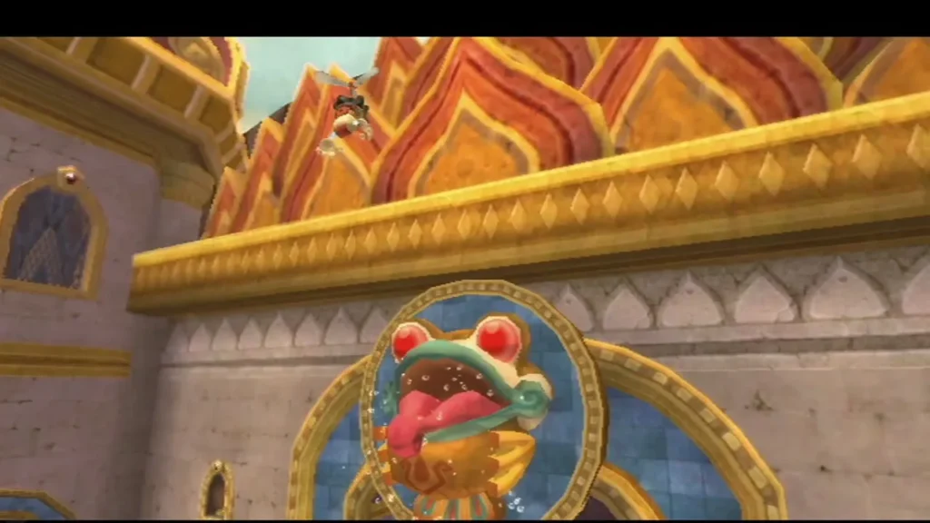 A frog ornament above the flame-lit door, with the basin set over its open mouth. A frog ornament above the flame-lit door, with the basin set over its open mouth.
