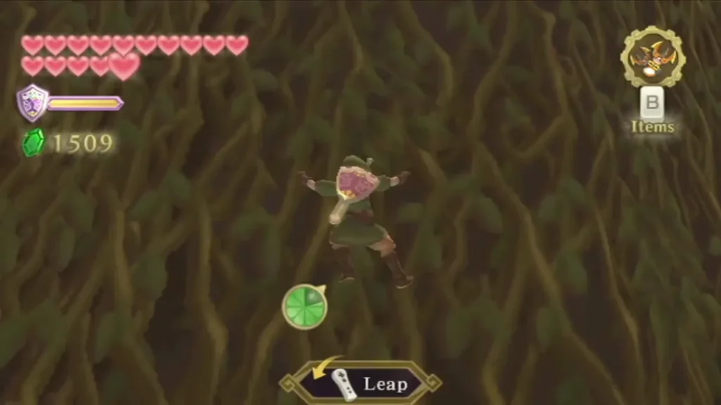 Link leaps against a wall of climbing vines, the Leap prompt on screen Link leaps against a wall of climbing vines, the Leap prompt on screen