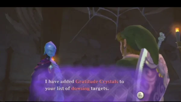 A blue spirit in a purple-trimmed robe tells Link that Gratitude Crystals are now on his dowsing list. A blue spirit in a purple-trimmed robe tells Link that Gratitude Crystals are now on his dowsing list.