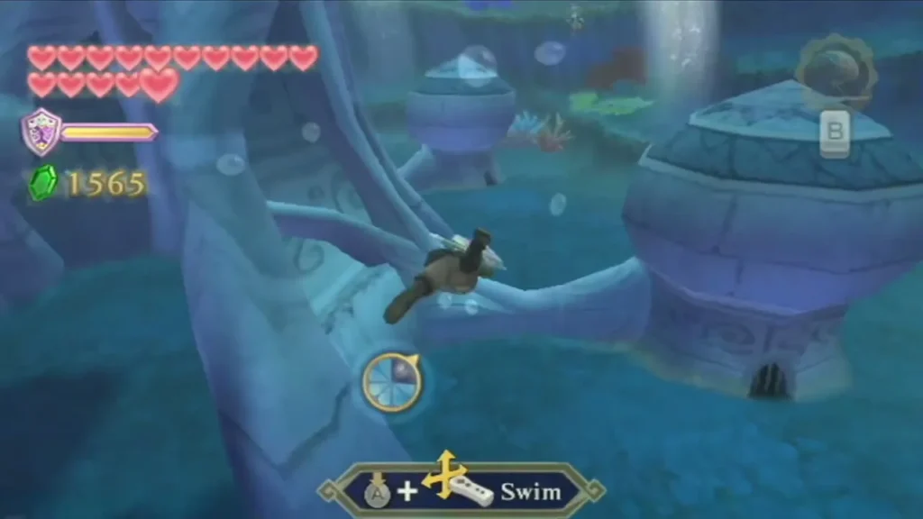 Link swims through a blue underwater passage at Lake Floria, with the Swim prompt on screen. Link swims through a blue underwater passage at Lake Floria, with the Swim prompt on screen.