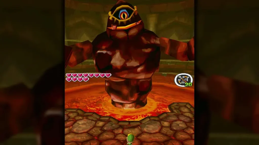 Cragma standing over the lava in the Fire Temple boss arena with Link and the bow ready Cragma standing over the lava in the Fire Temple boss arena with Link and the bow ready