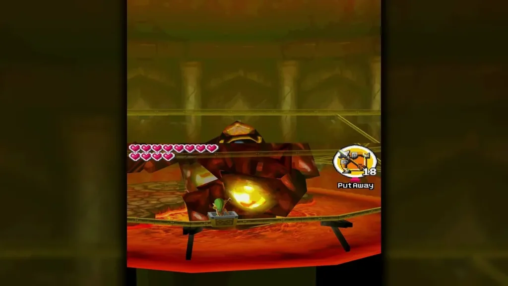 Link riding the mine cart platform up the Fire Temple chamber as Cragma's glowing spot shows Link riding the mine cart platform up the Fire Temple chamber as Cragma's glowing spot shows