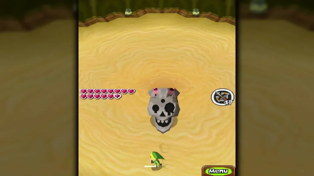 Skeldritch's skull bouncing across the Sand Temple arena with Link near the edge Skeldritch's skull bouncing across the Sand Temple arena with Link near the edge
