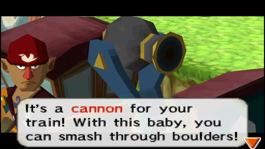 A red-capped engineer beside a cannon for Link's train, with a message box saying it can smash through boulders A red-capped engineer beside a cannon for Link's train, with a message box saying it can smash through boulders