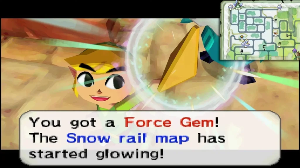 Link holding up a Force Gem, the box saying the Snow rail map has started glowing Link holding up a Force Gem, the box saying the Snow rail map has started glowing