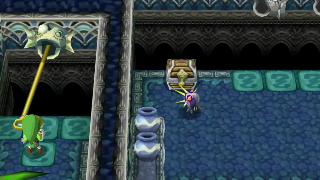 A silver ChuChu crackling with yellow sparks stands by a chest while Link reaches with his Whip across the gap A silver ChuChu crackling with yellow sparks stands by a chest while Link reaches with his Whip across the gap