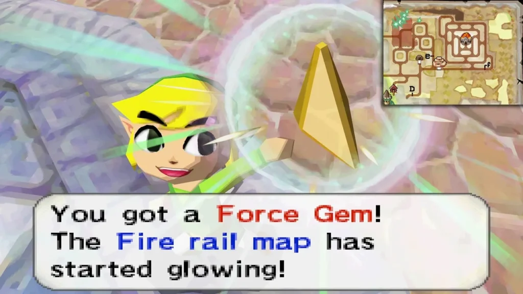Link holding up a Force Gem as the Fire rail map starts glowing
