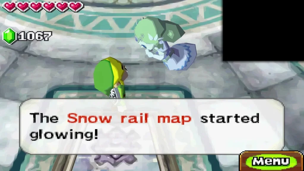 The message The Snow rail map started glowing! appears as Link and the spirit stand in the Snow Temple boss hall The message The Snow rail map started glowing! appears as Link and the spirit stand in the Snow Temple boss hall