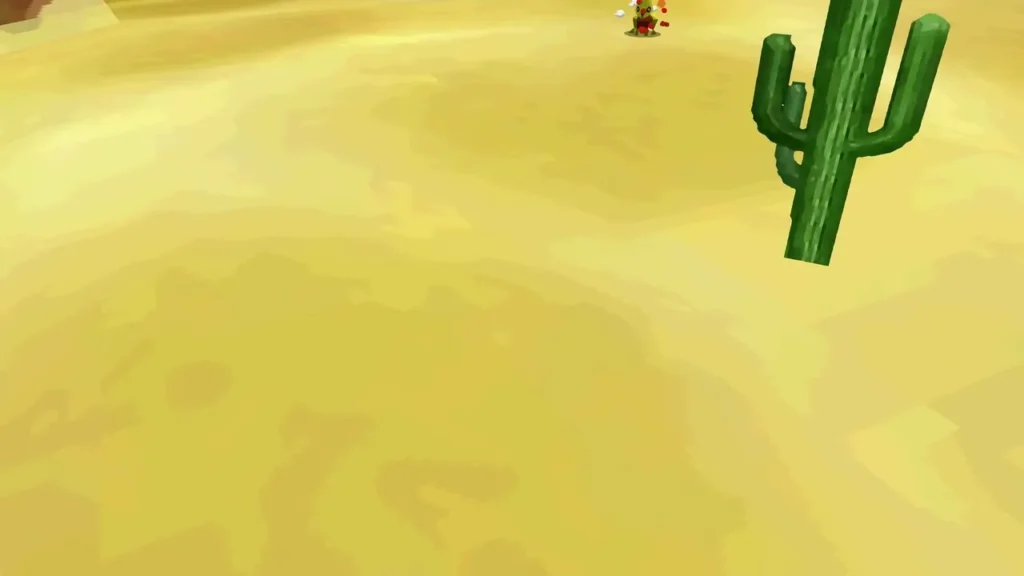 A rabbit runs across the dunes beyond a tall cactus A rabbit runs across the dunes beyond a tall cactus