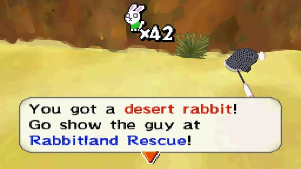 You got a desert rabbit! message on sand with a rock wall and a spiky desert plant behind it You got a desert rabbit! message on sand with a rock wall and a spiky desert plant behind it