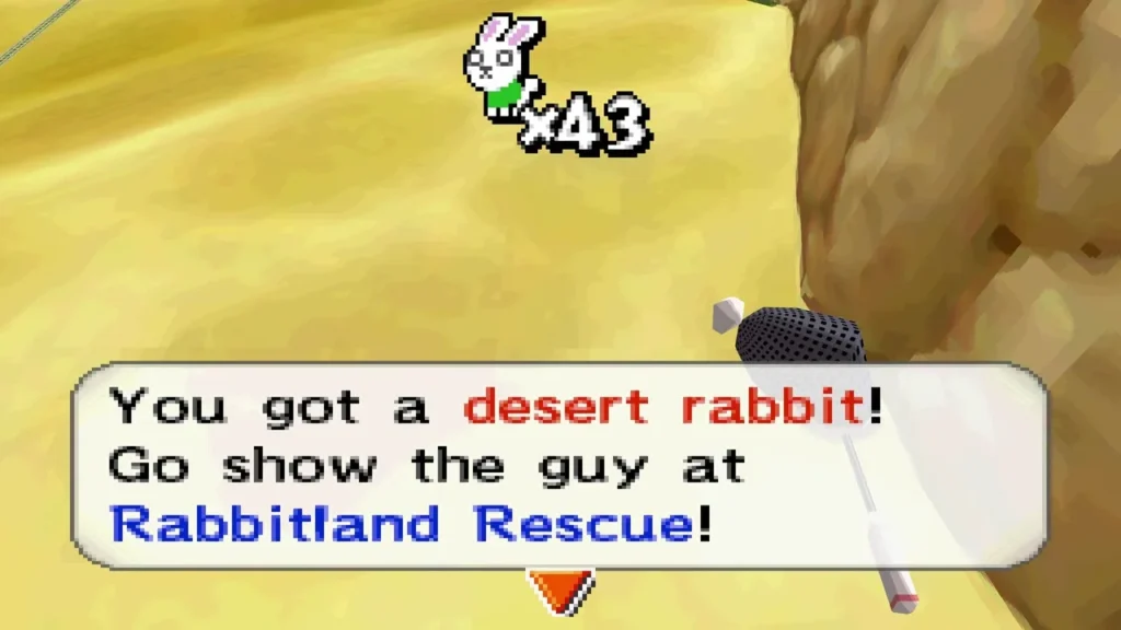 You got a desert rabbit! message on sand with a rock outcrop on the right side You got a desert rabbit! message on sand with a rock outcrop on the right side
