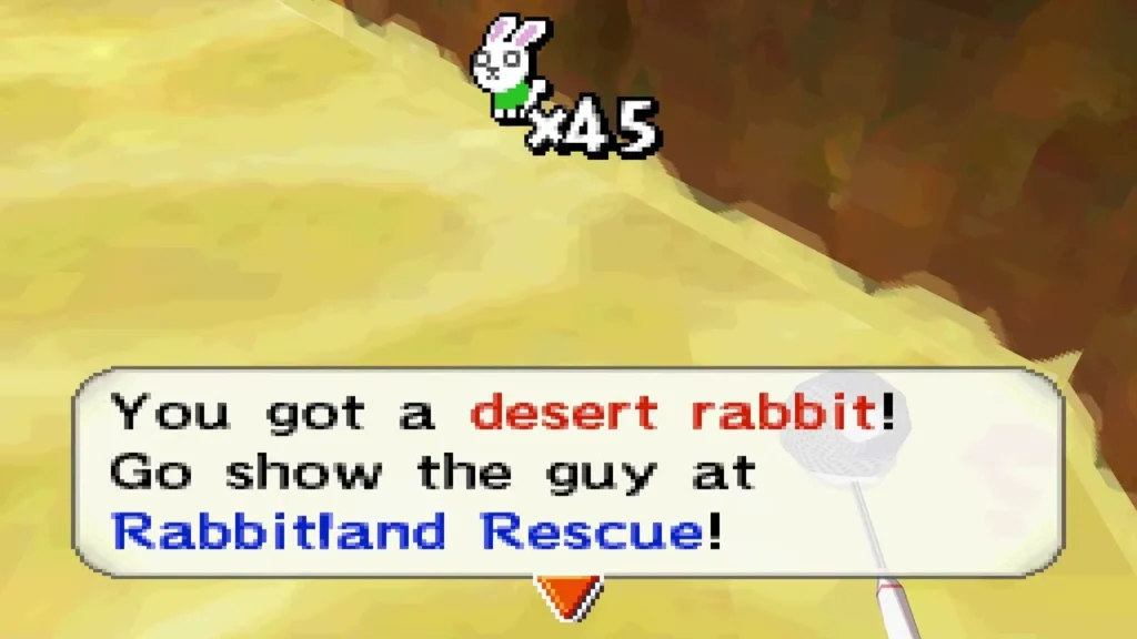 You got a desert rabbit! message in a sandy canyon with rock walls You got a desert rabbit! message in a sandy canyon with rock walls
