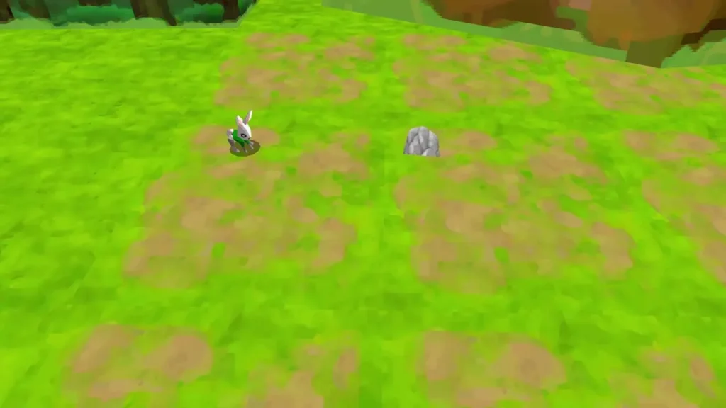 Grass rabbit on a patchy grass plain with a boulder, rock cliff above Grass rabbit on a patchy grass plain with a boulder, rock cliff above