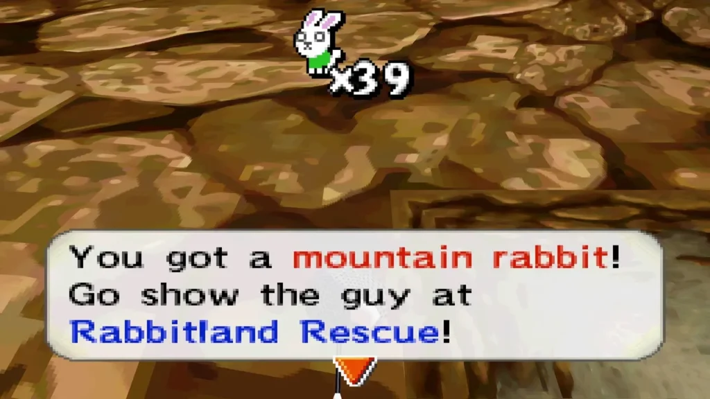 Box reads You got a mountain rabbit! over cracked rocky ground. Box reads You got a mountain rabbit! over cracked rocky ground.