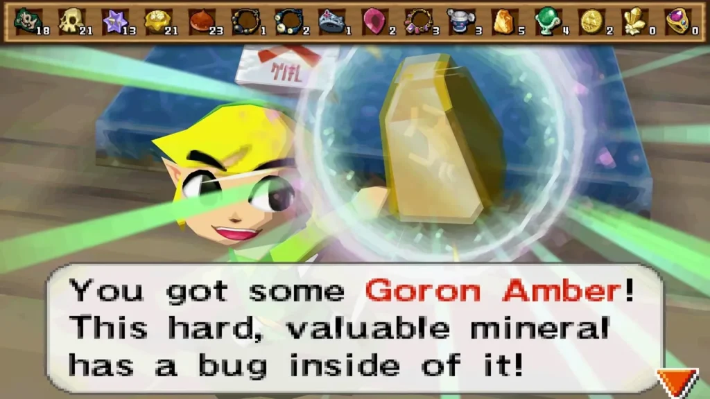 Link holds up a Goron Amber bought at Beedle's Air Shop, with its item message box fully shown. Link holds up a Goron Amber bought at Beedle's Air Shop, with its item message box fully shown.