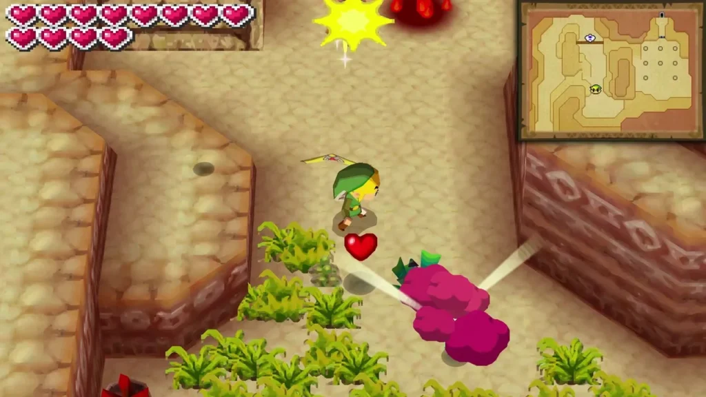 Link attacking a pink Fire Baba among grass in the Fire Realm cave, with a heart dropped nearby Link attacking a pink Fire Baba among grass in the Fire Realm cave, with a heart dropped nearby