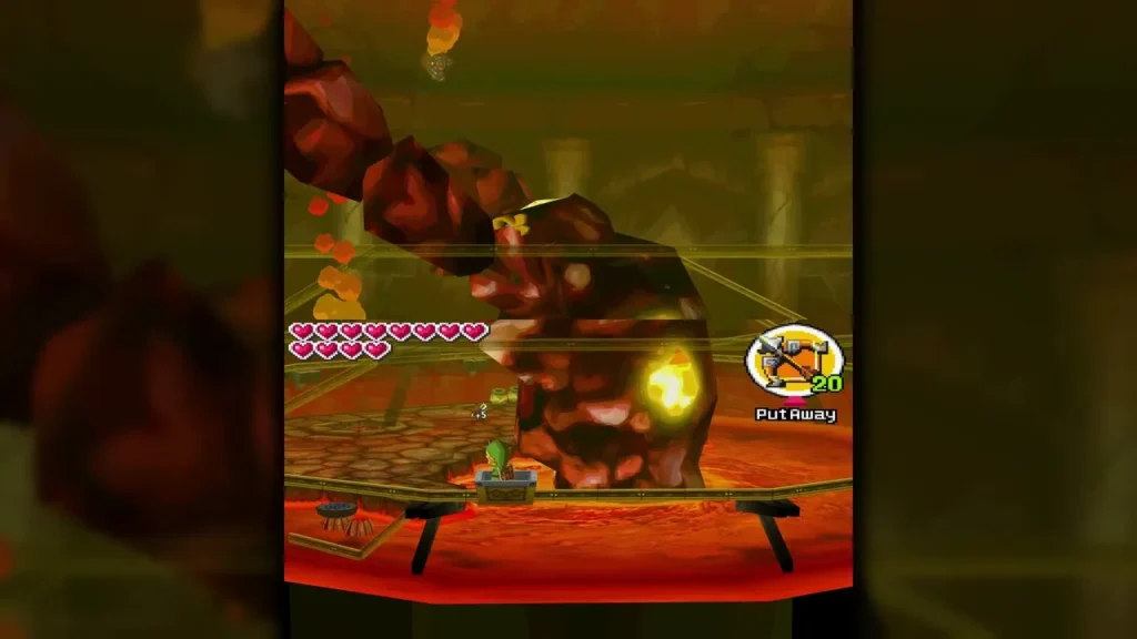 Cragma's glowing weak spot lit up on his body as Link rides the cart around the arena Cragma's glowing weak spot lit up on his body as Link rides the cart around the arena