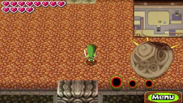 Heatoise, a shelled lava beast, curled up and rolling toward Link across the lava room Heatoise, a shelled lava beast, curled up and rolling toward Link across the lava room