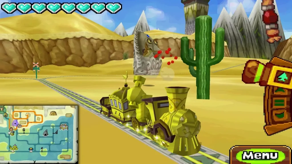 Spirit Train on desert rails beside a tall cactus Spirit Train on desert rails beside a tall cactus