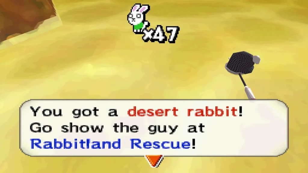 Link catches a desert rabbit with the net, message box shown Link catches a desert rabbit with the net, message box shown