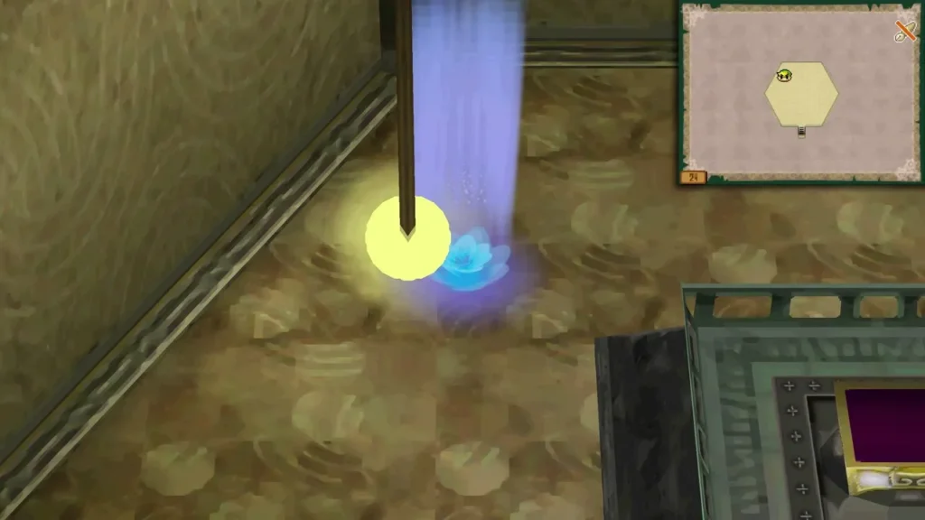 A glowing blue portal beam beside a yellow orb on the floor of the Tower of Spirits