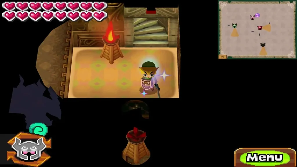 Link beside a lit torch on a stone floor in a Tower of Spirits room
