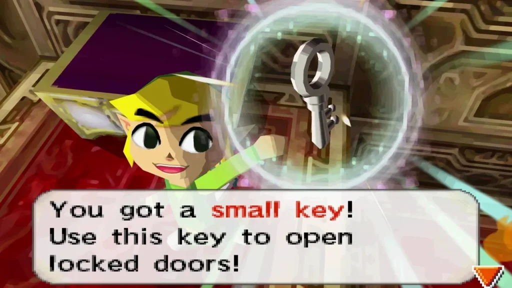 Link holding up a small key, the box reading 'You got a small key! Use this key to open locked doors!'