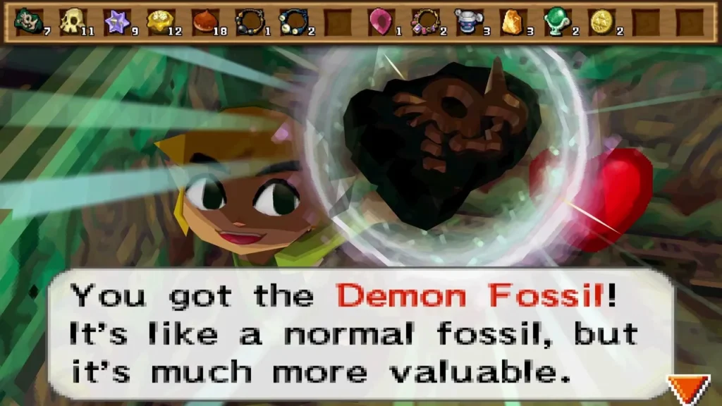 Link holding up a Demon Fossil with the item name box on screen Link holding up a Demon Fossil with the item name box on screen