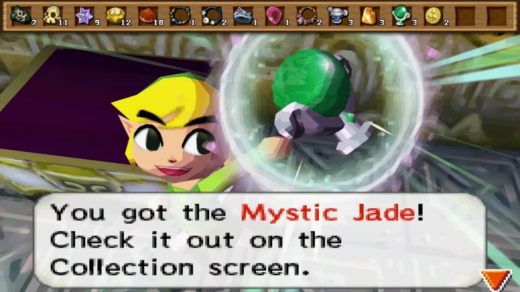 Link holding up a Mystic Jade from the chest with the item name box on screen Link holding up a Mystic Jade from the chest with the item name box on screen