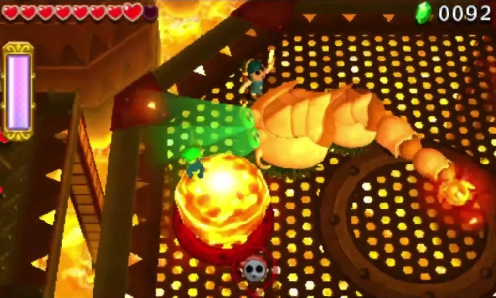 Moldorm raises its tail high above the Fire Temple platform as lava pillars burn nearby Moldorm raises its tail high above the Fire Temple platform as lava pillars burn nearby