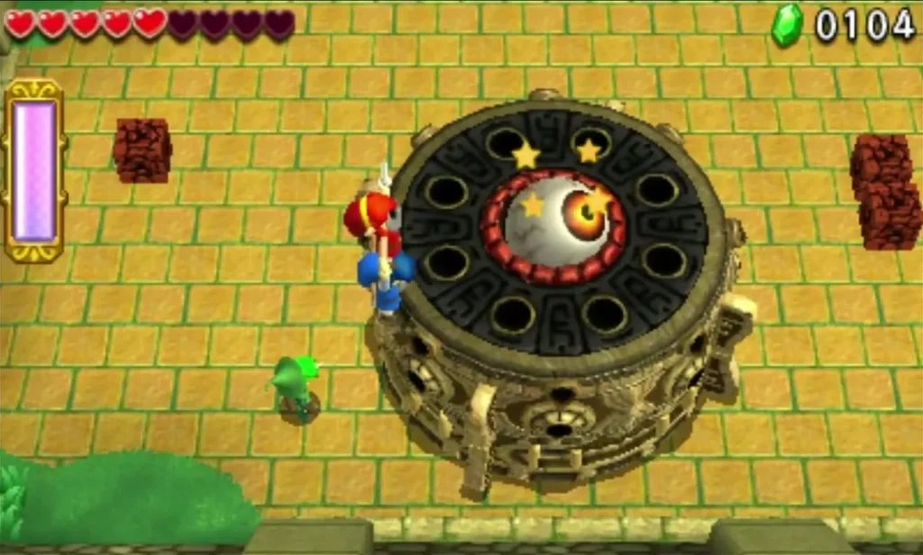 Dazed Margoma with its eye exposed and stars circling it while Link stands near Dazed Margoma with its eye exposed and stars circling it while Link stands near