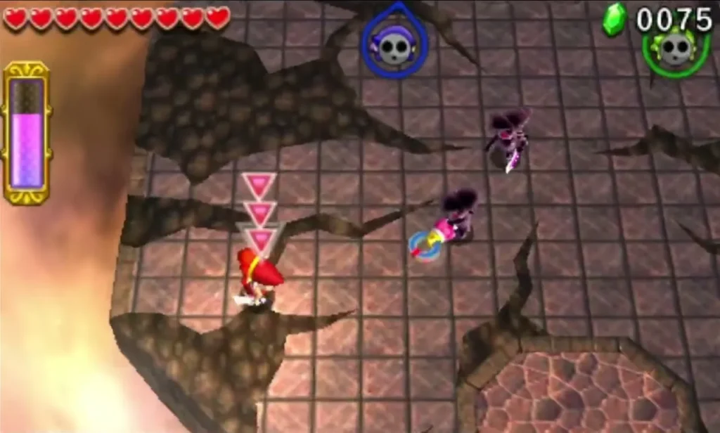Dark shadow foes close in on Link and his companions on a cracked stone floor Dark shadow foes close in on Link and his companions on a cracked stone floor