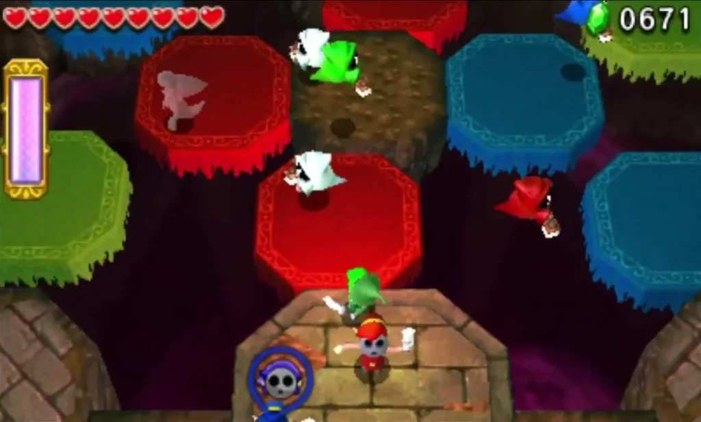 Link on a platform of red, blue and green octagonal blocks over a dark pit in the Ruins floors Link on a platform of red, blue and green octagonal blocks over a dark pit in the Ruins floors