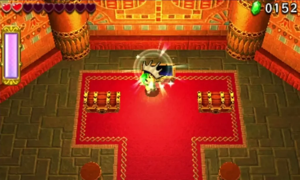 Link stands on the red carpet between two chests in the Gibdo Mausoleum end room