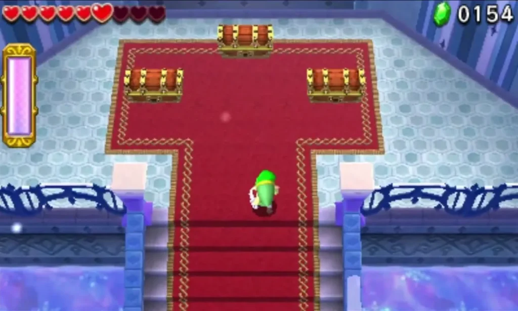 Link on a red carpet below three chests at the top of the Snowball Ravine end room