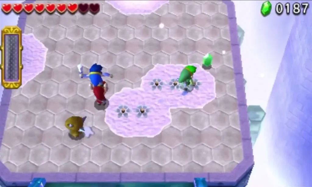 A Deadrock lurks near Link and his companion on an icy tiled platform in the Silver Shrine