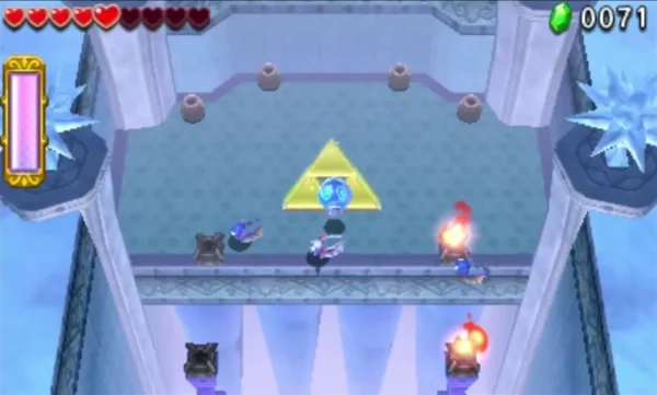Blue Ice Keese flutter around Link on a tiled floor with a glowing Triforce mark in the Ice Temple
