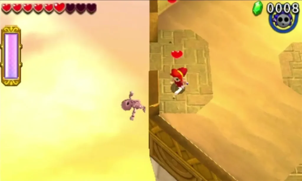 A pink creature crawling on a sand island in the Sky Realm near Link on a stone pillar
