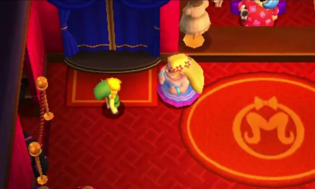 Link on the red M rug of the Hytopia workshop beside a blonde woman in a pink dress Link on the red M rug of the Hytopia workshop beside a blonde woman in a pink dress