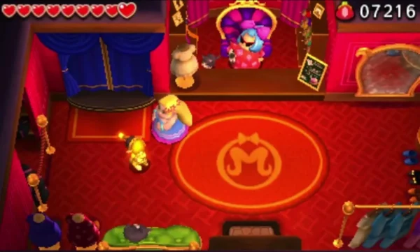 Link steps into Madame Sastria's red workshop, where she waits on her throne beside the round M rug Link steps into Madame Sastria's red workshop, where she waits on her throne beside the round M rug