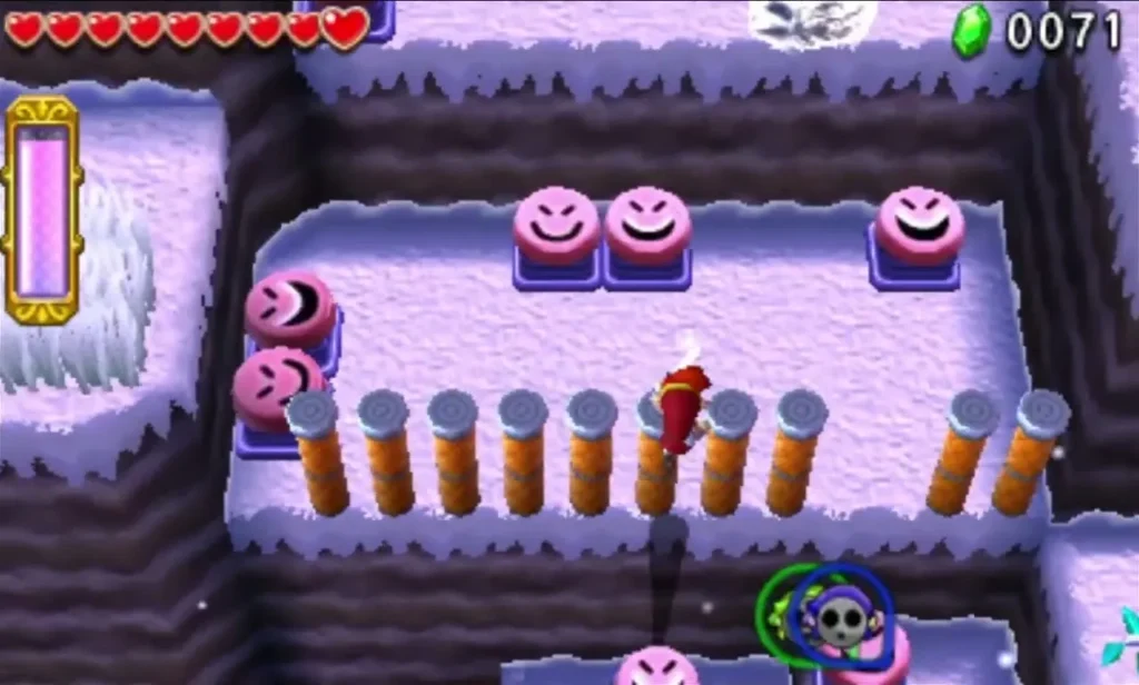 Links on a snowy platform in Silver Shrine stage 1 with pink grinning blobs and wooden posts