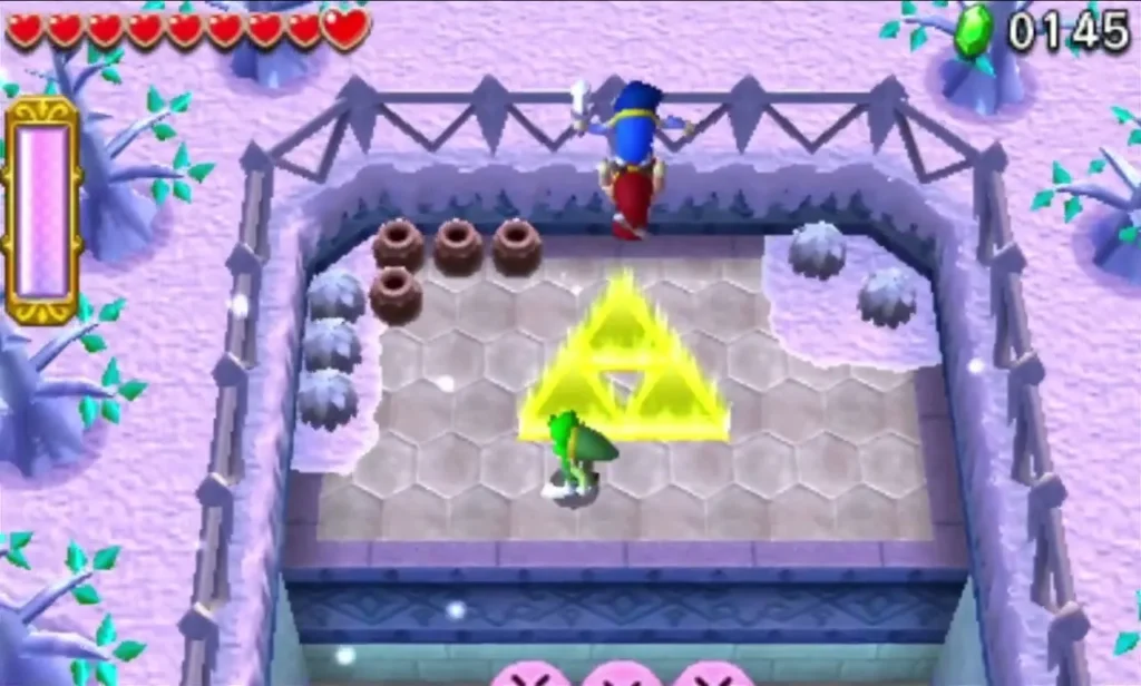 The yellow Triforce Gateway glows on a hexagon-tiled platform at the end of Silver Shrine stage 2