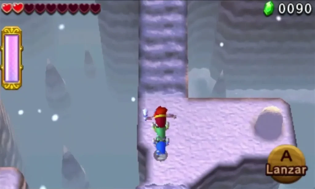 Link climbs a winding snowy mountain path between rock walls in Snowball Ravine stage 3