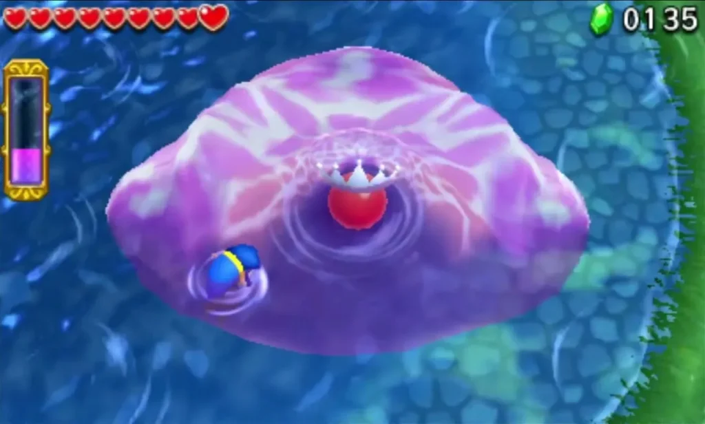 The Electric Blob Queen on the pool with her red core exposed