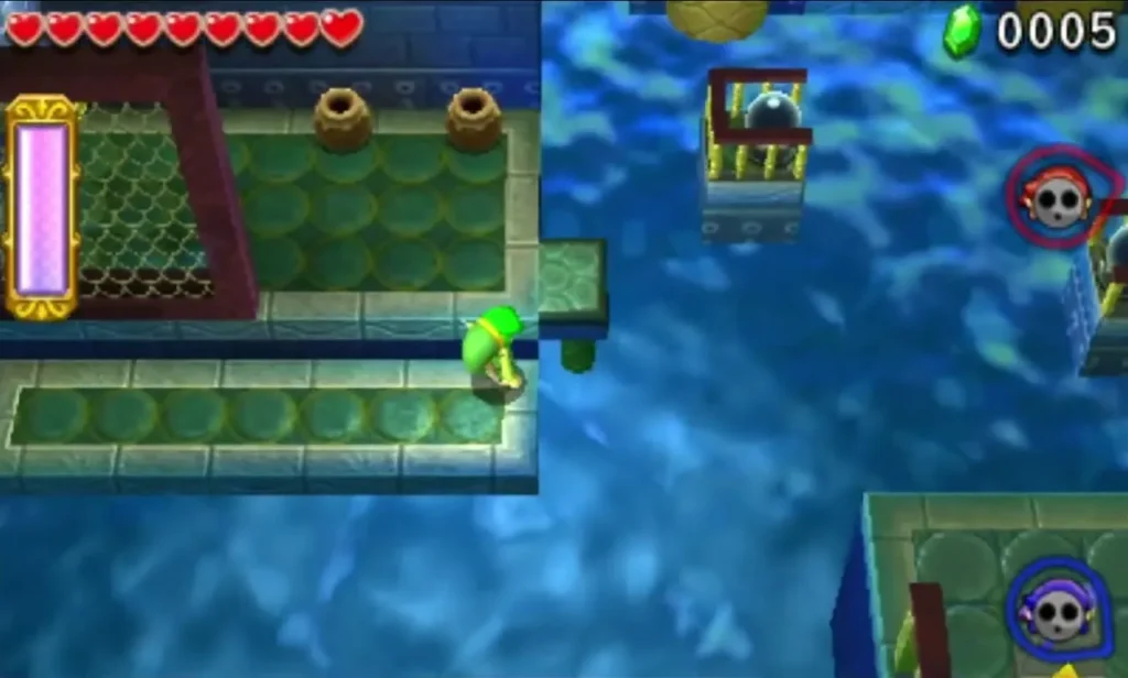 A mesh fence across a corner of the Water Temple pool, with a Link on the ledge below